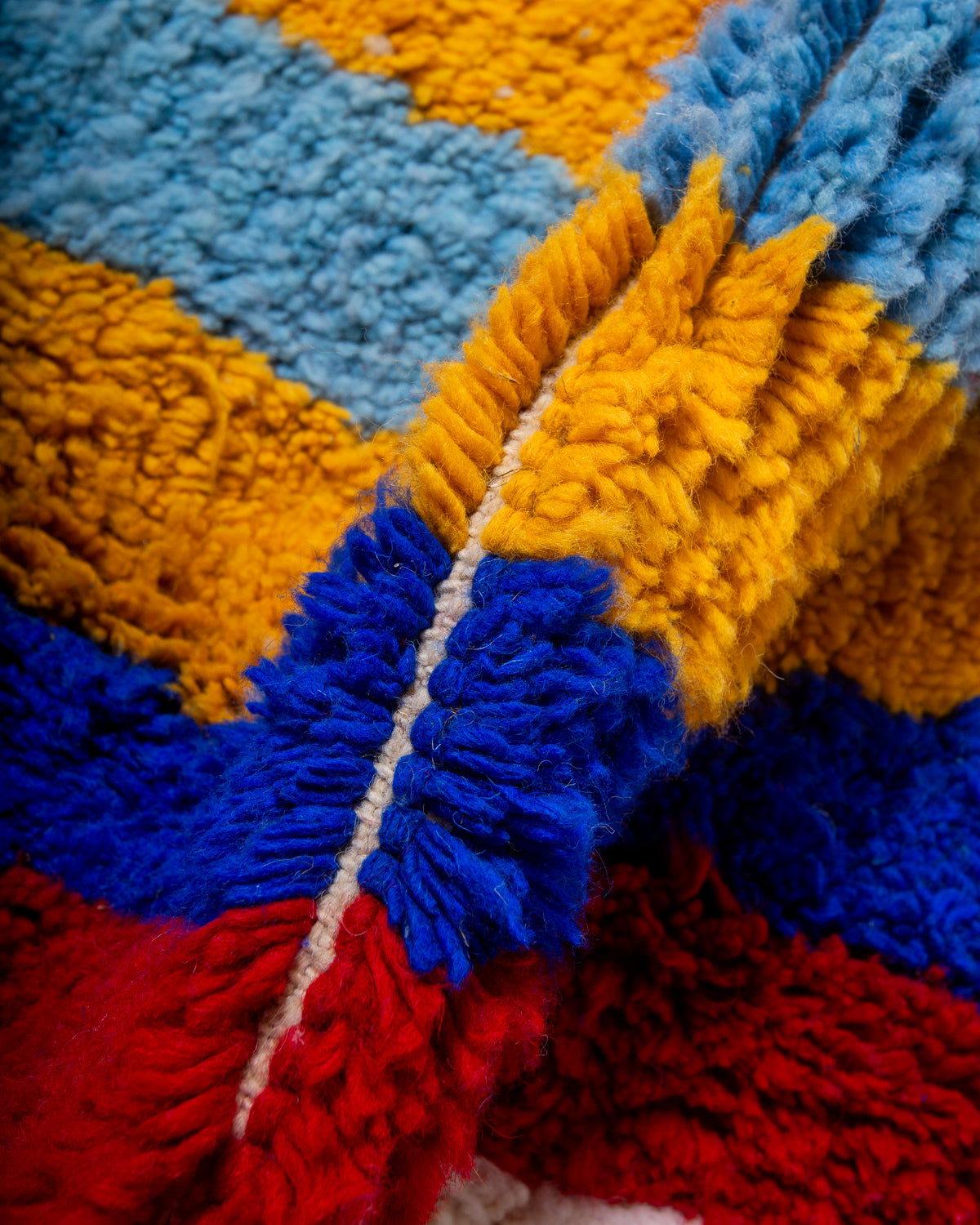 Modern, designer, handcrafted Berber rug from Morocco. Beniourain carpet with beautiful colours and patterns and fluffy wool texture.